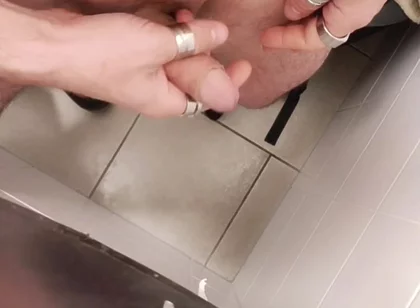 Jerking off a Cock in a Public Toilet